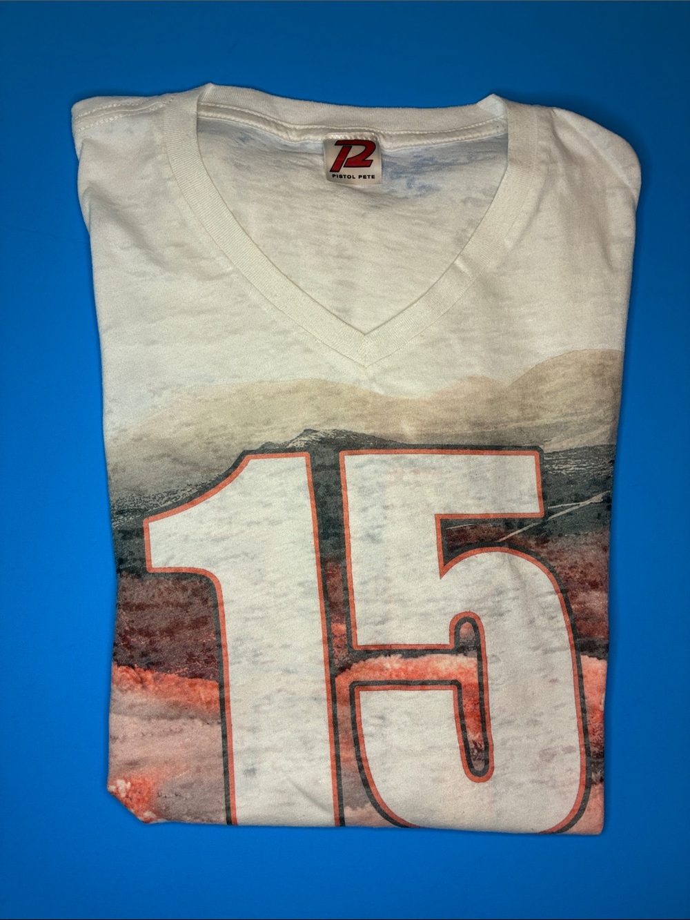 Pistol Pete men’s large White V-Neck Graphic Tee with Orange Accent